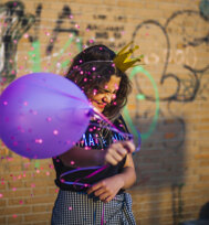 birthday-girl-with-balloons.jpeg