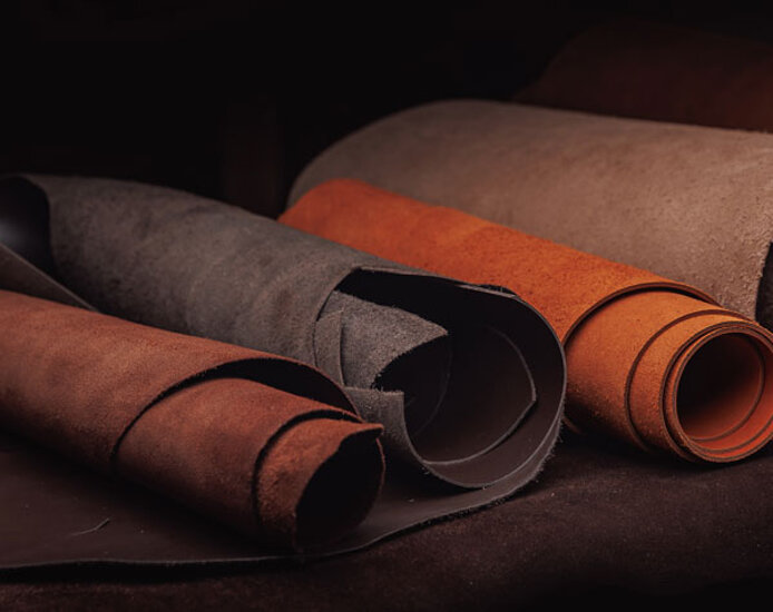 Leather rolls ready for the production of handcrafted guitar straps