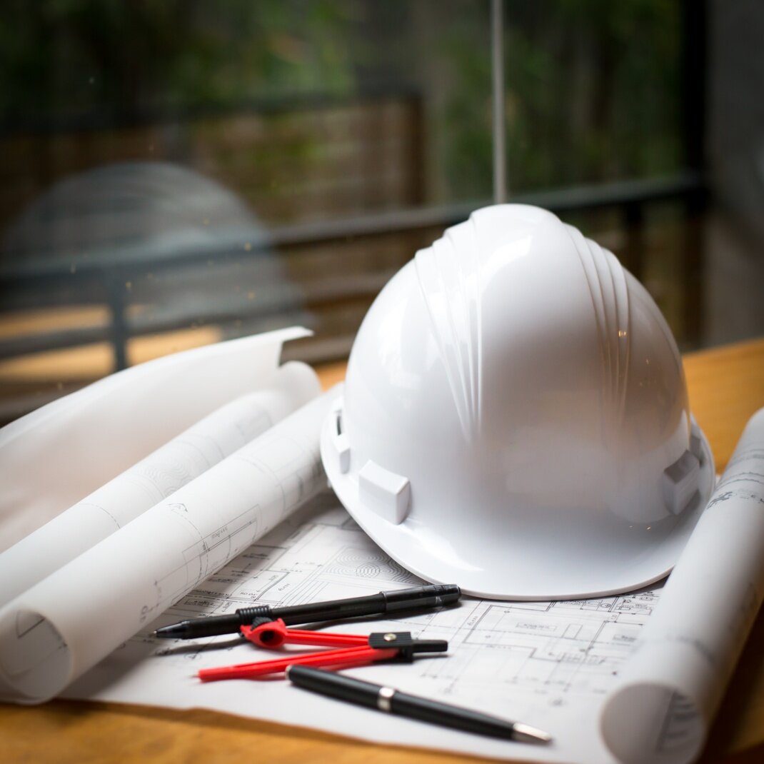 construction-concept-image-helmet-rolled-blueprints-wooden-boards-retro-style-r.jpeg construction-concept-image-helmet-rolled-blueprints-wooden-boards-retro-style-r.jpeg