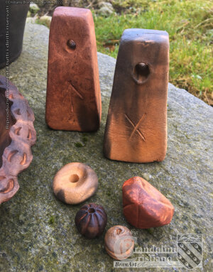 Pesi da telaio e fusarole. Museo Archeologico ORMA, Pezzaze (BS).