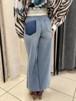 jeans-con-strappi-e-patch-sul-retro-taglio-largo