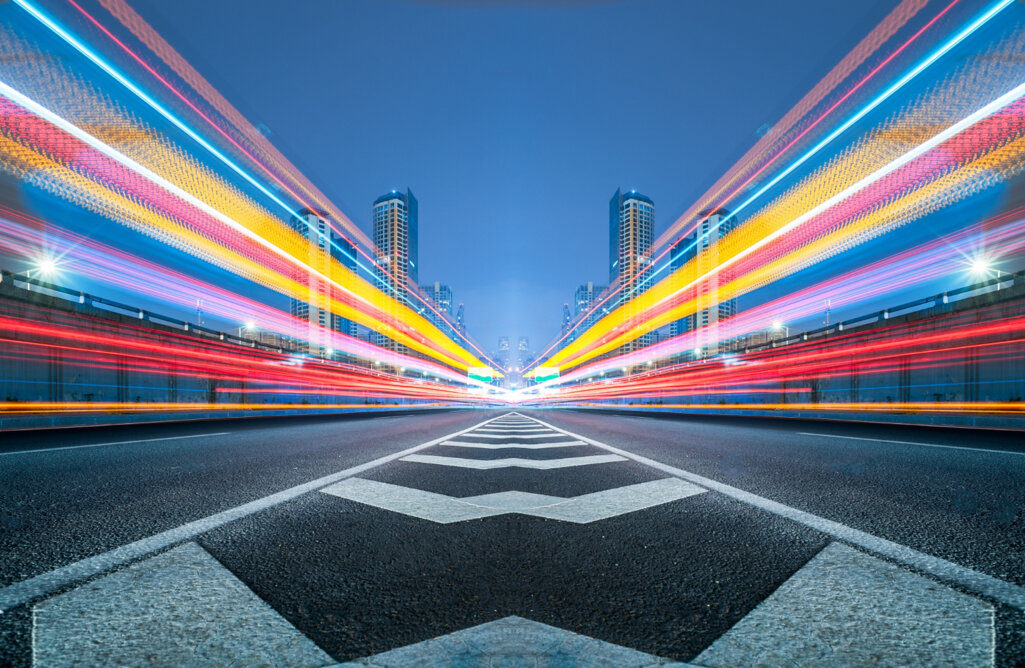 blurred-traffic-light-trails-road.jpeg