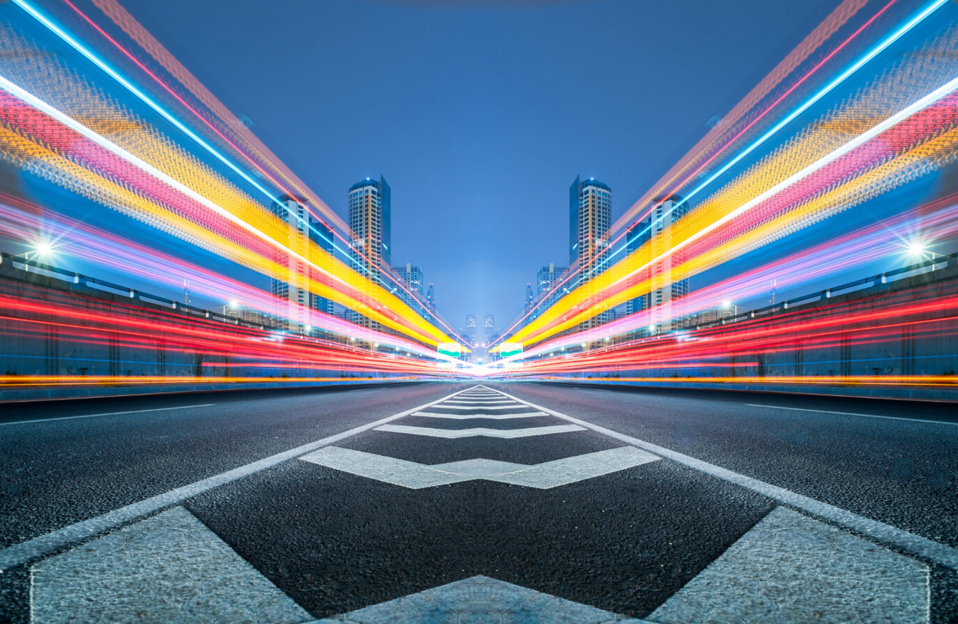 blurred-traffic-light-trails-road.jpeg