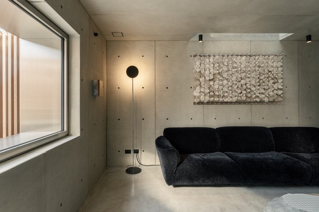 Interno in cemento armato faccia a vista del progetto Vertigo, Piraccini e Potente Architettura