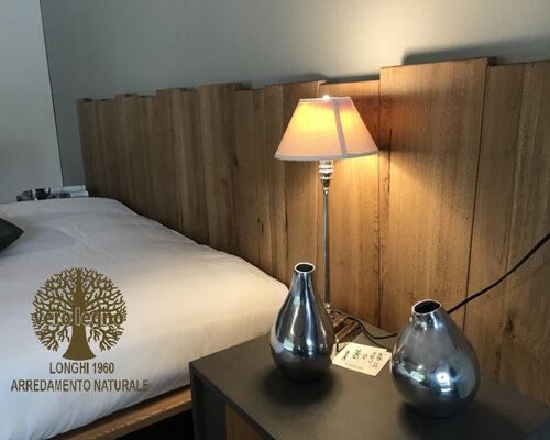 testiera letto su misura in legno a travi sfalsate Pavia Lombardia