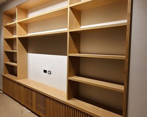 mobile grande libreria con vano tv su misura montaggio svizzera