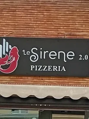 Insegna luminosa a led con pannelli in metacrilato e dibond traforato Roma Nettuno