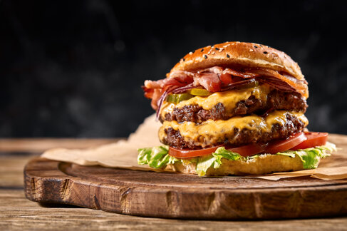 juicy-american-burger-hamburger-cheeseburger-with-two-beef-patties-with-sauce-basked-black-space.jpeg juicy-american-burger-hamburger-cheeseburger-with-two-beef-patties-with-sauce-basked-black-space.jpeg