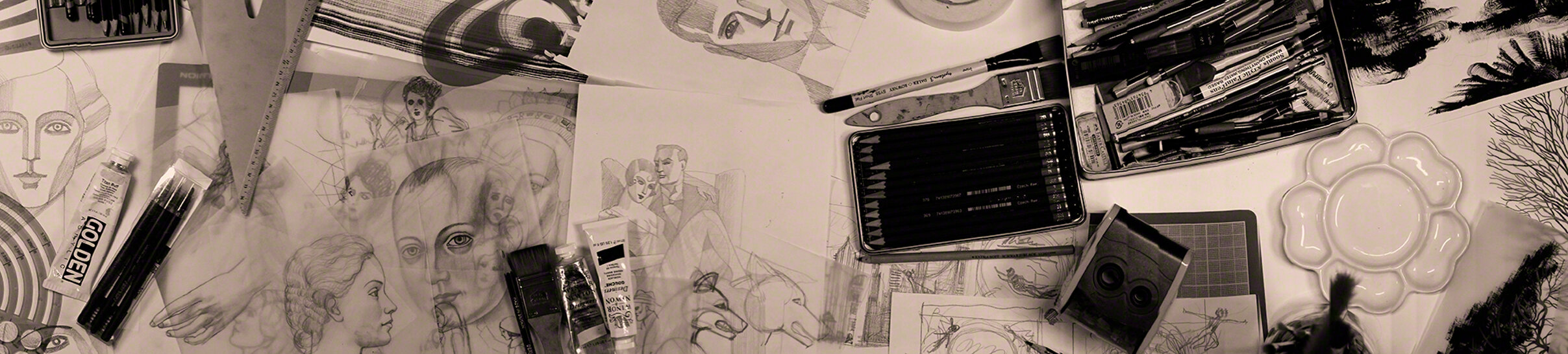 Handmade illustration process of Balbusso Twins showing a studio desk with pencil sketches, real paintbrushes, color tubes, and hand-painted tempera textures on paper before digital integration. Handmade illustration process of Balbusso Twins showing a studio desk with pencil sketches, real paintbrushes, color tubes, and hand-painted tempera textures on paper before digital integration.
