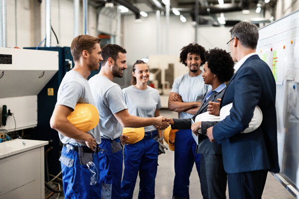 company-managers-visiting-their-employees-factory-happy-african-american-businesswoman-is-shaking-hands-with-one-worker.jpeg company-managers-visiting-their-employees-factory-happy-african-american-businesswoman-is-shaking-hands-with-one-worker.jpeg