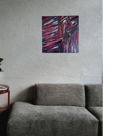 quadro colorato kaos su parete divano