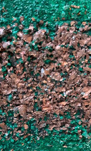 dettaglio del quadro terra verde e marrone