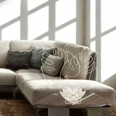 Centrotavola decorativo in filo di ferro con due foglie stilizzate di monstera, design minimalista