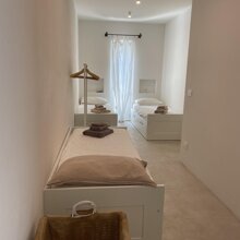 Camera da letto con tre letti singoli