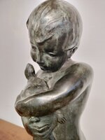 scultura-in-bronzo-bimbo-con-tartarughe