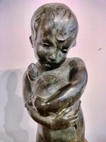 scultura-in-bronzo-bimbo-con-tartarughe