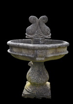 antica-fontana-in-pietra-con-pesci