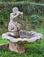 monumentale-fontana-con-tritone-in-travertino