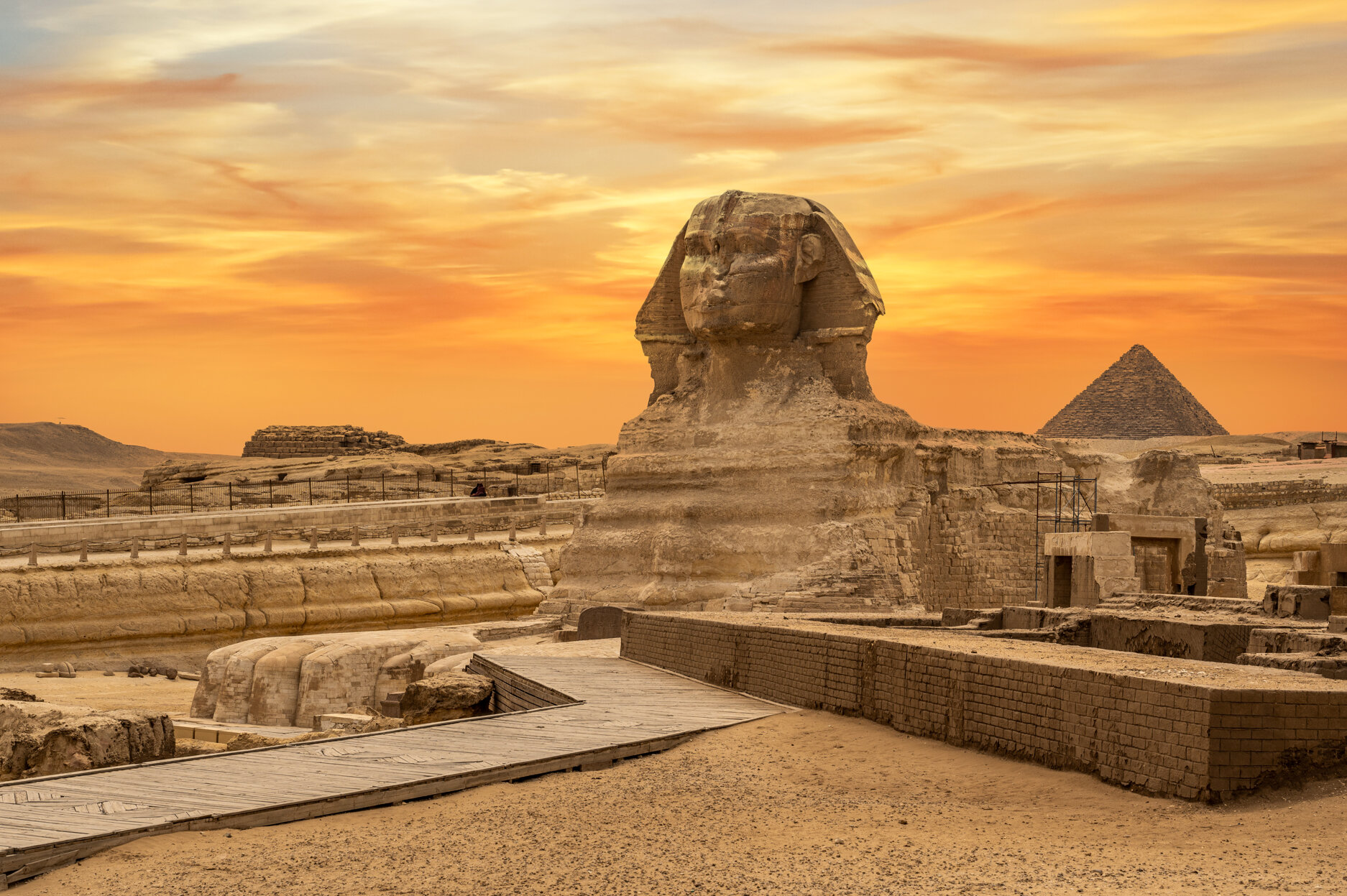landscape-with-egyptian-pyramids-great-sphinx-silhouettes-ancient-symbols-landmarks-egypt-your-travel-concept-africa-golden-sunlight-sphinx-giza-pyramid-complex-sunset.jpeg
