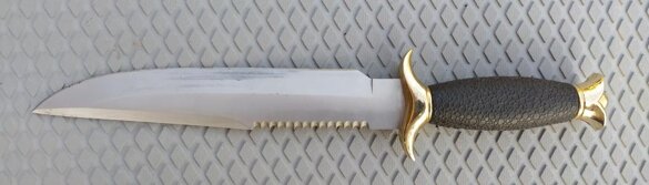 coltello caccia lato dx 398k.jpeg coltello caccia lato dx 398k.jpeg