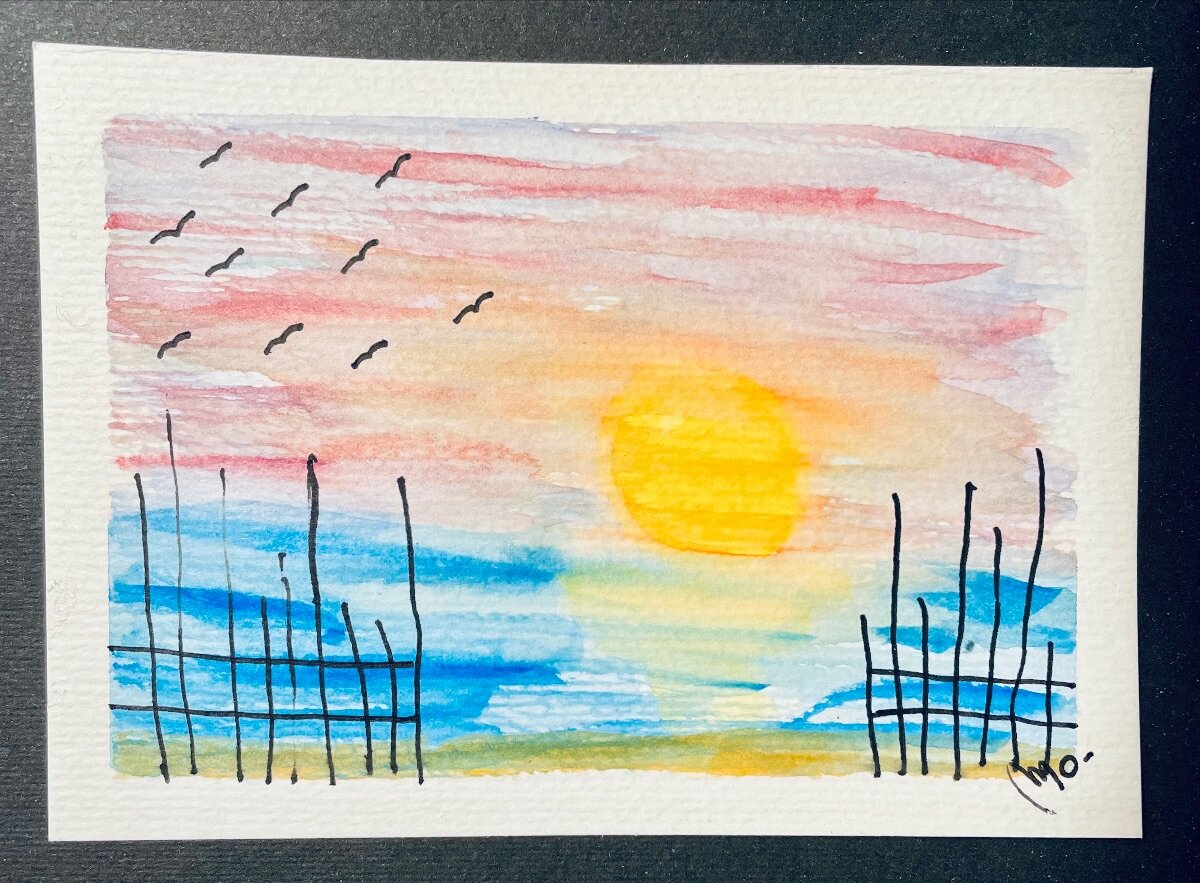 cielo, mare e sole ad acquerello con la tecnica del disegno a specchio