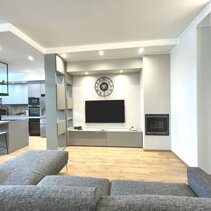 Progetto Interni globale con Ristrutturazione Parete attrezzata per TV Salotto in Open Space