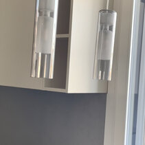 Realizzazione Progetto Arredamento per Interni Dettaglio lampade a sospensione sopra penisola cucina