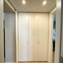 Realizzazione Progetto Arredamento per Interni Armadiature su misura per lavanderia/Ripostiglio nel Disimpegno tra zona giorno-notte