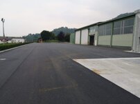 Rifacimento su cemento Fresatura pavimentazione in cemento, rinforzo con geogriglie e tappeto con bitume modificato