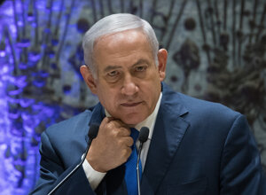 bnu%20smoking%20cigar%20-%20must%20credit%20alex%20levac%20haaretz.jpeg