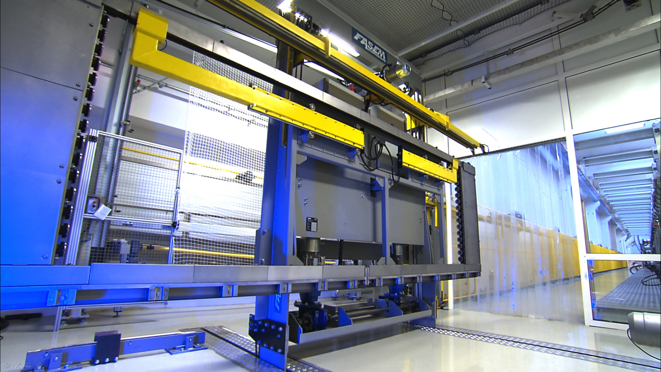 Progettazione e realizzazione linea robotizzata per movimentazione e accumulo frame porta tubi Progettazione e realizzazione linea robotizzata per movimentazione e accumulo frame porta tubi