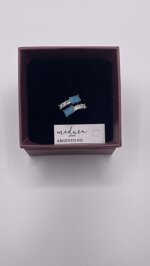 anello-in-argento-con-zirconi-bianchi-e-azzurri-medusa-gioielli