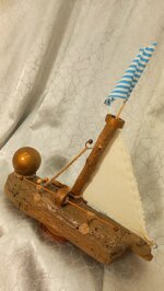 driftwood-sailing-boat-golden-ball