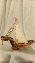 driftwood-sailing-boat-wave