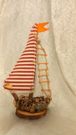 small-driftwood-saling-boat