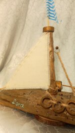 driftwood-sailing-boat-golden-ball