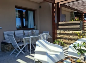 Esterni nel giardino dell'appartamento con Veranda vista mare e giardino a Stintino