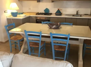 Soggiorno dall'appartamento Capo Falcone con vista mare a Stintino