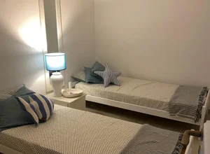 Cameretta con letti singoli a Stintino