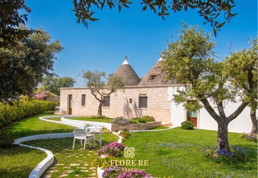 Luxury masseria for sale in Ostuni Puglia with private pool Exclusive seaside villa for sale in Polignano a Mare Restored luxury trullo with swimming pool in Valle d'Itria Historic luxury palazzo in Lecce Salento Italy High-end countryside estate with olive grove in Apulia Luxury Italian property for sale in Puglia with panoramic sea view