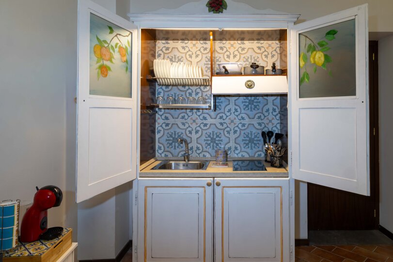 Pratico angolo cottura in casa vacanze per turisti