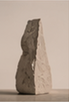 Sculptural artefact within a restrained architectural setting