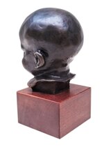 balestrieri-bernardo-18841965-bambino-che-ride-da-un-modello-di-meta-xx-secolo