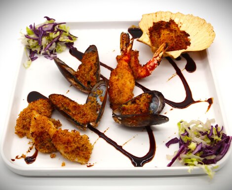 Misto mare gratinato di cozze, calamari e gamberi