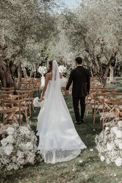 Bride and groom intimate portrait during ceremony in Tuscany, wedding planned by CG wedding and event designer