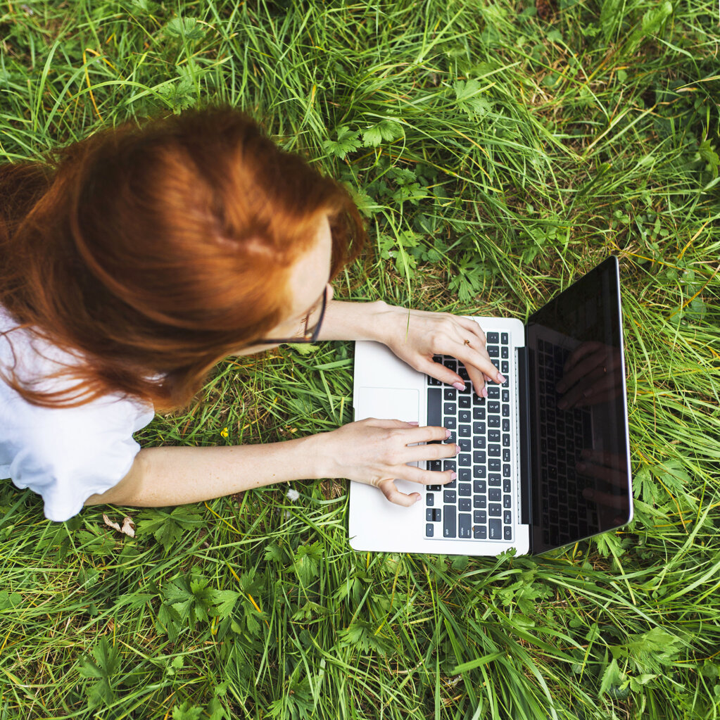 young-woman-lying-grass-with-laptop.jpeg young-woman-lying-grass-with-laptop.jpeg
