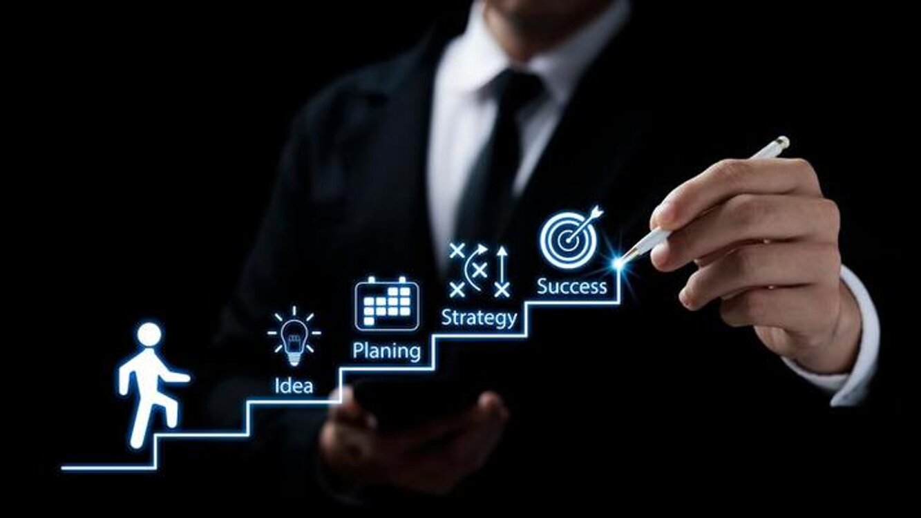 businessmen-point-to-successful-business-growth-plans-ladder-of-success-action-planning-and-long-term-business-goals-photo.jpeg