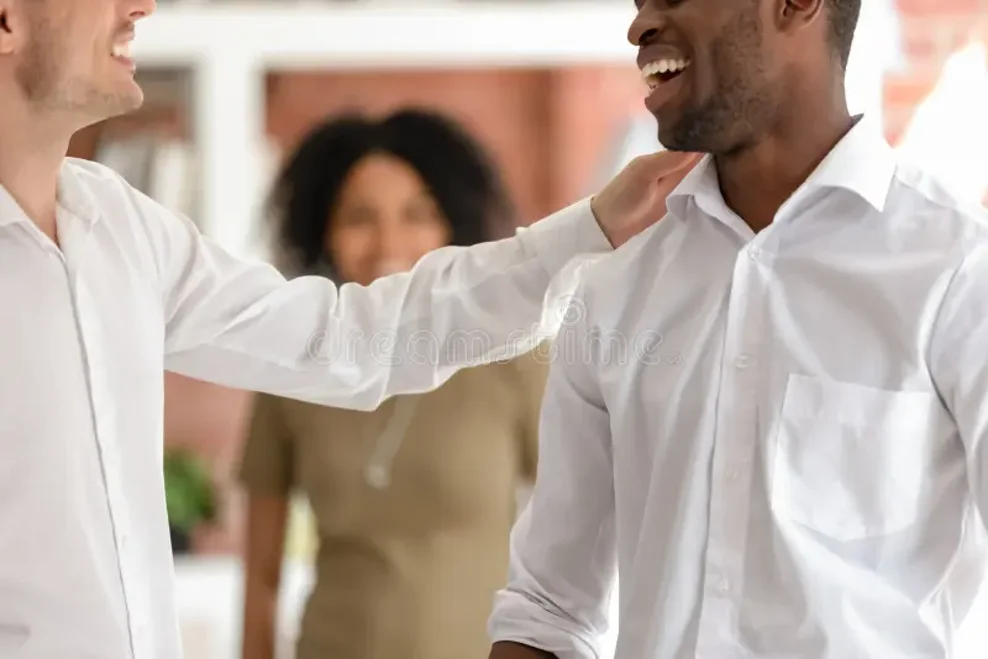 close-up-smiling-man-tap-shoulder-greeting-colleague-close-up-smiling-caucasian-men-tap-shoulder-african-american-169396781 close-up-smiling-man-tap-shoulder-greeting-colleague-close-up-smiling-caucasian-men-tap-shoulder-african-american-169396781