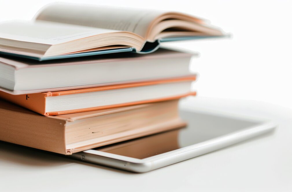 vecteezy_stacked-books-on-a-tablet-with-open-pages-in-a-minimalist_48584127.jpeg vecteezy_stacked-books-on-a-tablet-with-open-pages-in-a-minimalist_48584127.jpeg