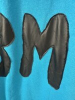 felpa-azzurra-con-zip-inserto-pelle